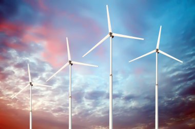Yeşil yenilenebilir enerji kavramı - Gökyüzünde rüzgar jeneratörü türbinleri