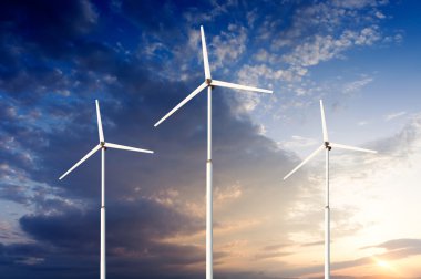 Yeşil yenilenebilir enerji kavramı - Gökyüzünde rüzgar jeneratörü türbinleri