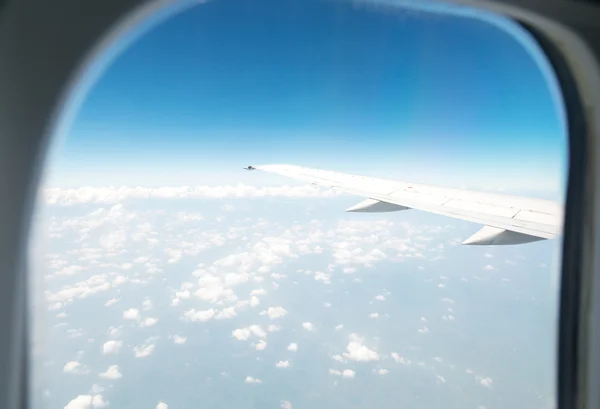 Wing aircraft in altitude during flight — Stock Photo, Image