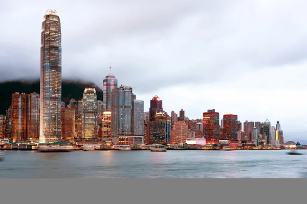 Hong kong night view of victoria harbour, hong kong island busine — Stockfoto