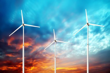 Yeşil yenilenebilir enerji kavramı - Gökyüzünde rüzgar jeneratörü türbinleri