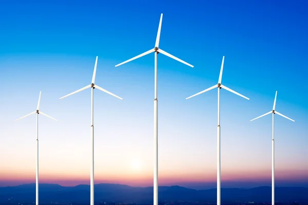Green renewable energy concept - wind generator turbines in sky — Stock Photo, Image