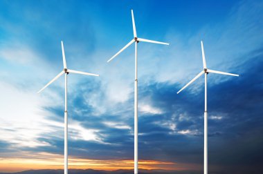 Yeşil yenilenebilir enerji kavramı - Gökyüzünde rüzgar jeneratörü türbinleri