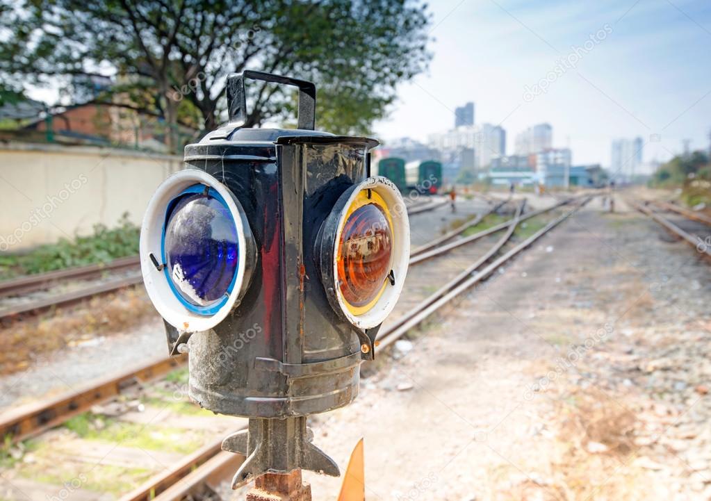 Traffic light shows blue signal on railway