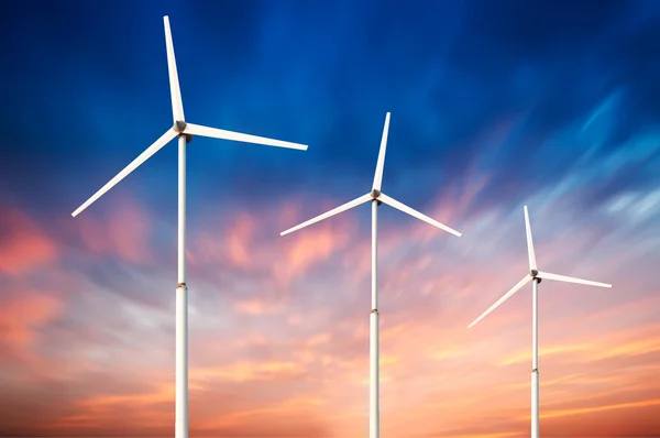 Green renewable energy concept - wind generator turbines in sky — Stock Photo, Image