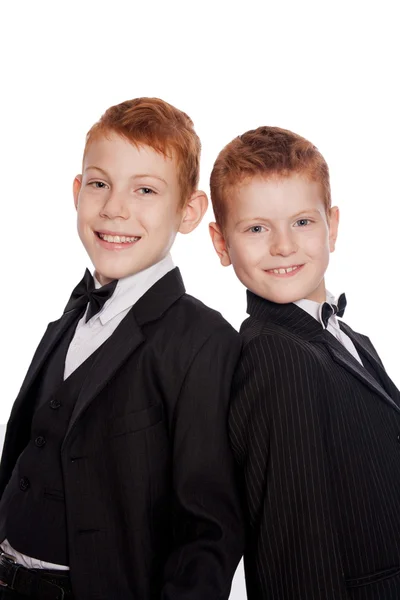 Вoys with red hair in a black suits — Stock Photo, Image