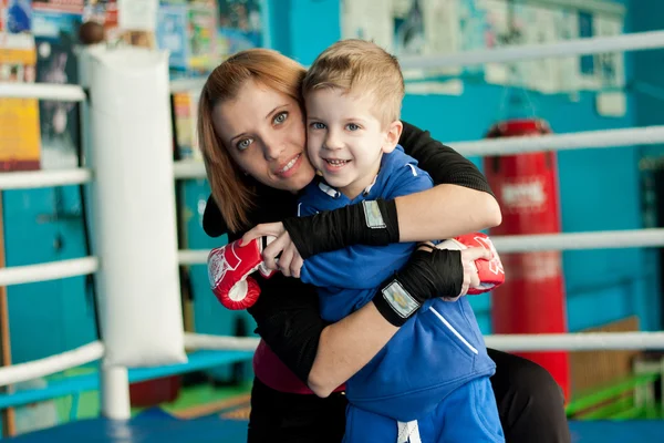 Family portrait. Mother and son in the gym — Stock Photo, Image