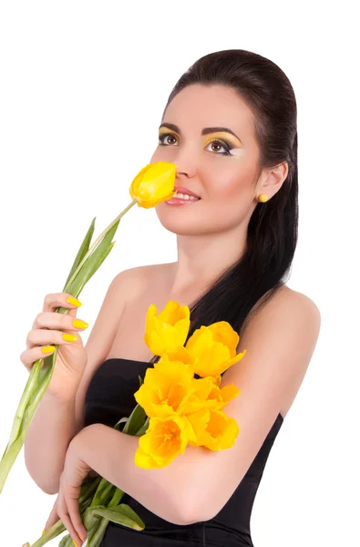 Ragazza con tulipani gialli — Foto Stock