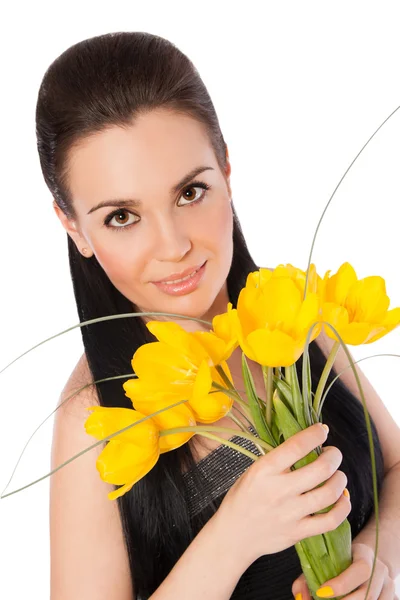 Ragazza con tulipani gialli — Foto Stock