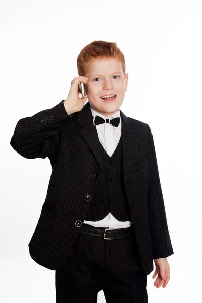 Red-haired boy talking on the phone — Stock Photo, Image