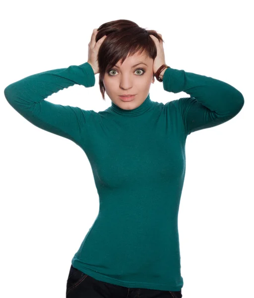 Fille émotionnelle dans un pull vert — Photo