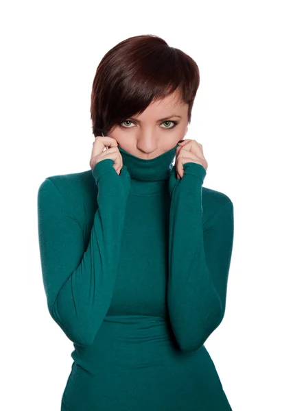 Emotional girl in a green jumper — Stock Photo, Image