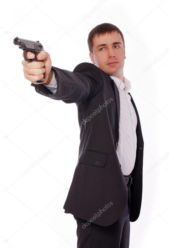 A man with a gun in his hand