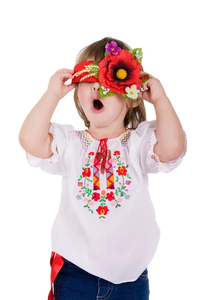 Emotional little girl with Ukrainian wreath. — Stock Photo, Image