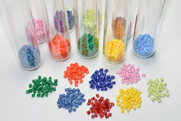 Dyed polymer in test glasses — Stock Photo, Image