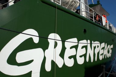 Greenpeace logo on their ship, the Rainbow Warrior III clipart