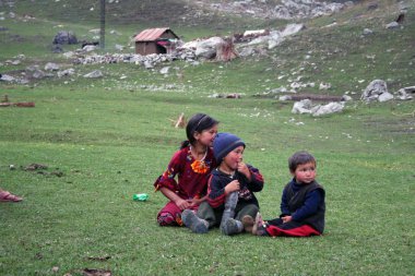 Uzbek children in Arslanbob, Kyrgystan clipart