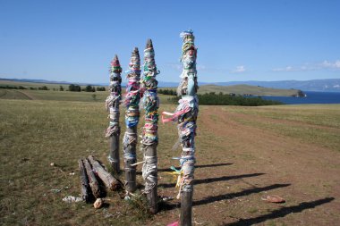 Pillars of the worship of spirits Olkhon Island clipart