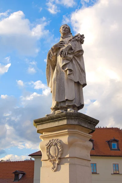 Statue of St. Philippus Benitius on Charles bridge, Prague — Stock Photo, Image