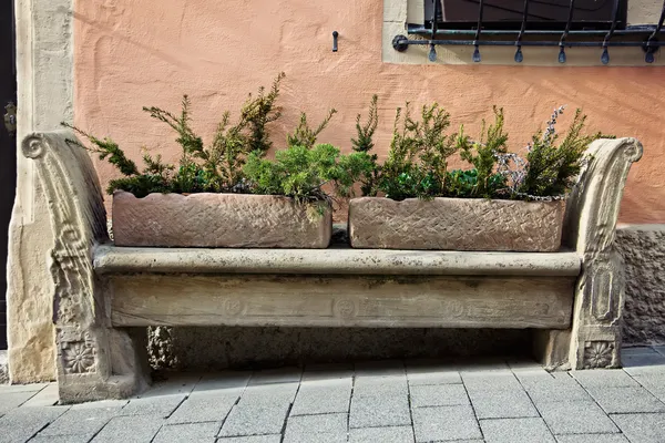 Stone carving bench in old town — Stock Photo, Image