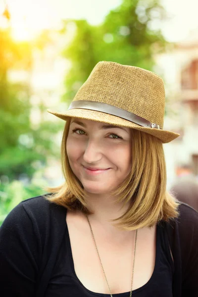 Closeup portrait of beautiful blonde girl in hat — Stock Photo, Image