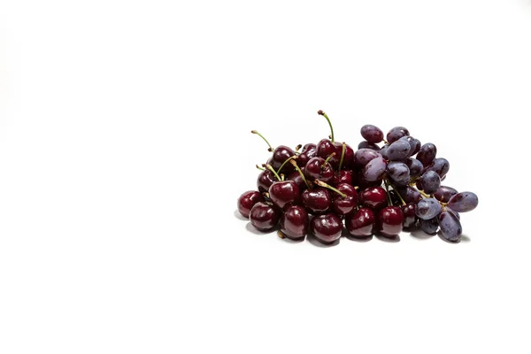 Fruit cherries and grapes — Stock Photo, Image