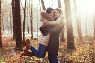 Sensual outdoor portrait of young couple in love