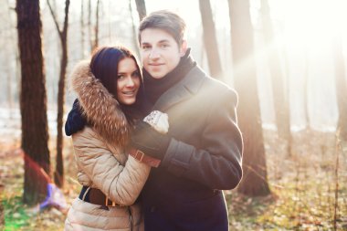 Sensual outdoor portrait of young couple in love