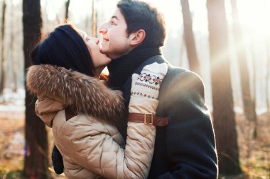 Sensual outdoor portrait of young couple in love