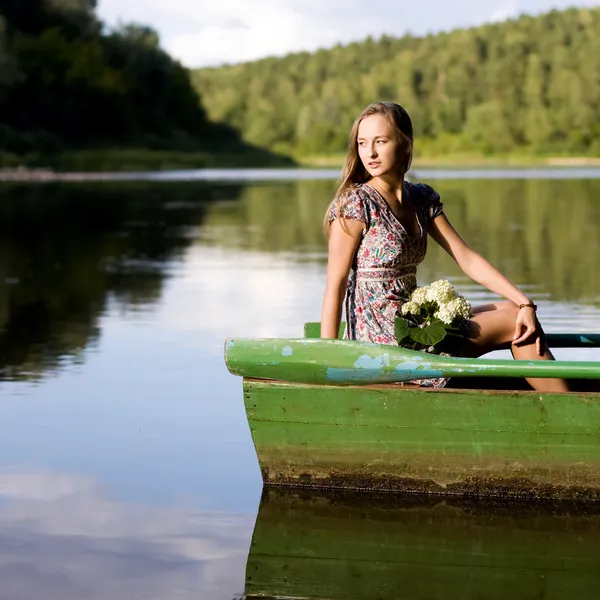 Girl on the river — Stock Photo, Image