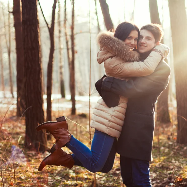 Sensual outdoor portrait of young couple in love