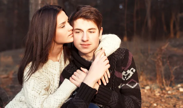 Sensual outdoor portrait of young couple in love