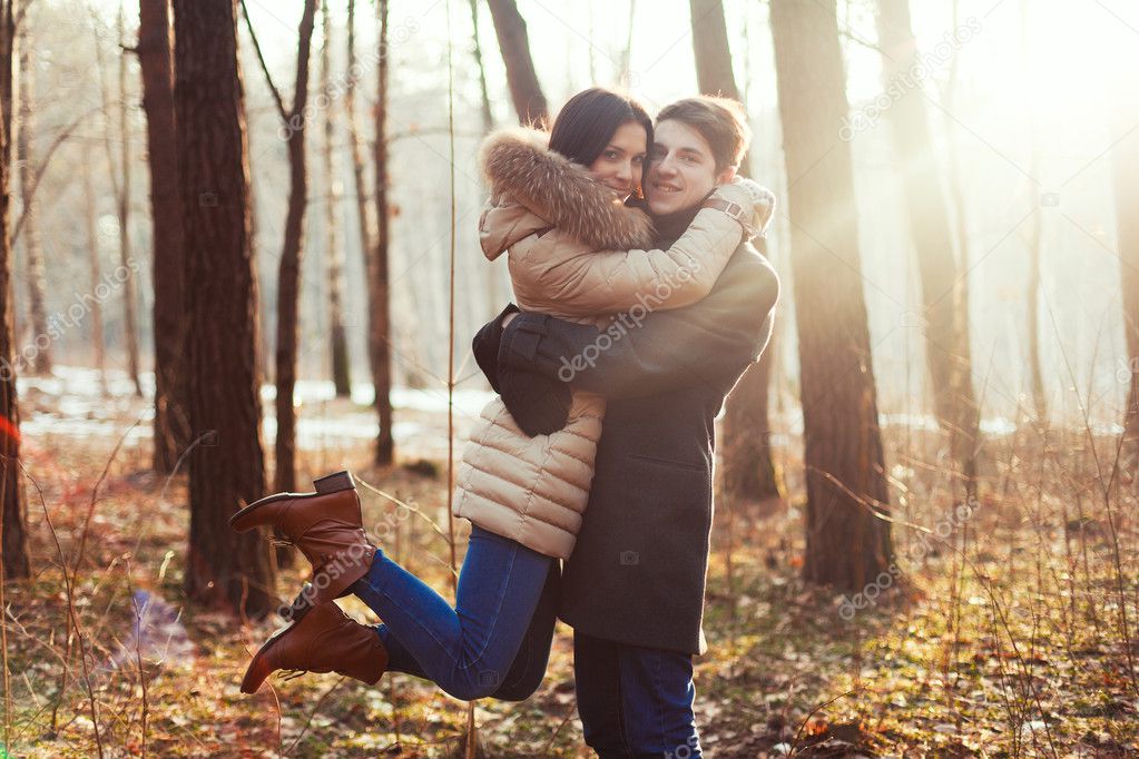Sensual outdoor portrait of young couple in love