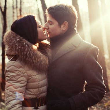Sensual outdoor portrait of young couple in love