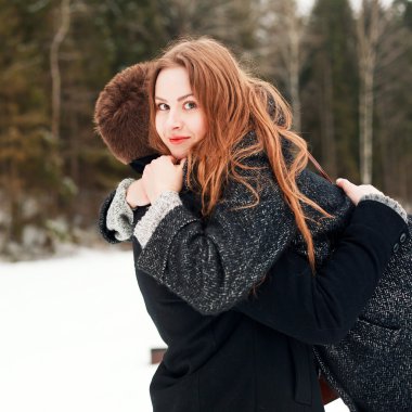 Young beautiful blonde hanging her boyfriend