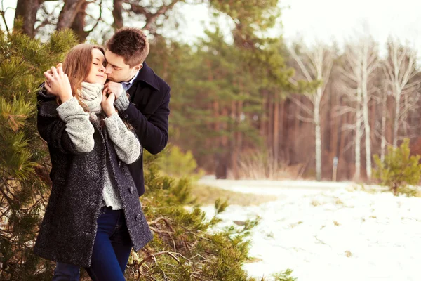 Couple in love in the cold spring forest — Stock Photo, Image