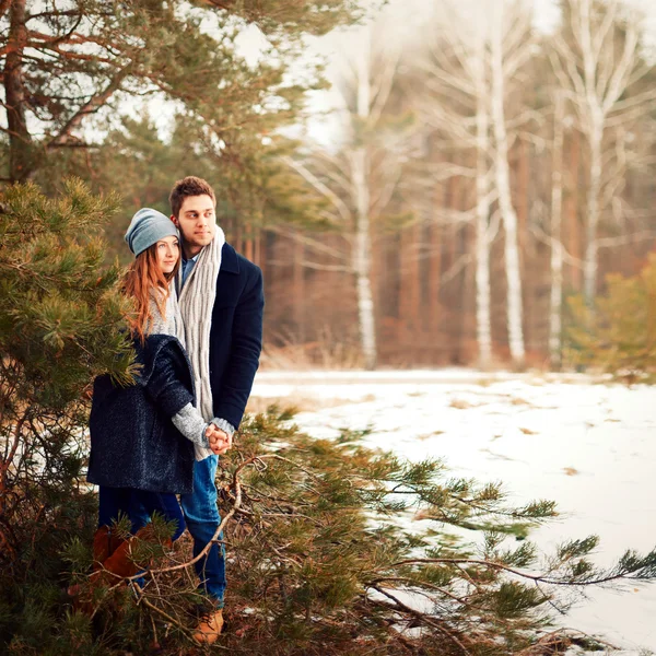 Couple in love in the cold spring forest — Stock Photo, Image