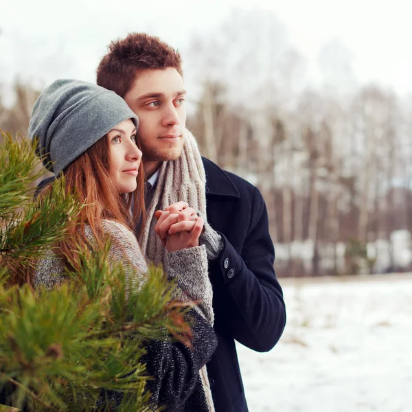 Couple in love in the cold spring forest — Stock Photo, Image