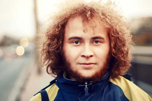 Young handsome curly man — Stock Photo, Image