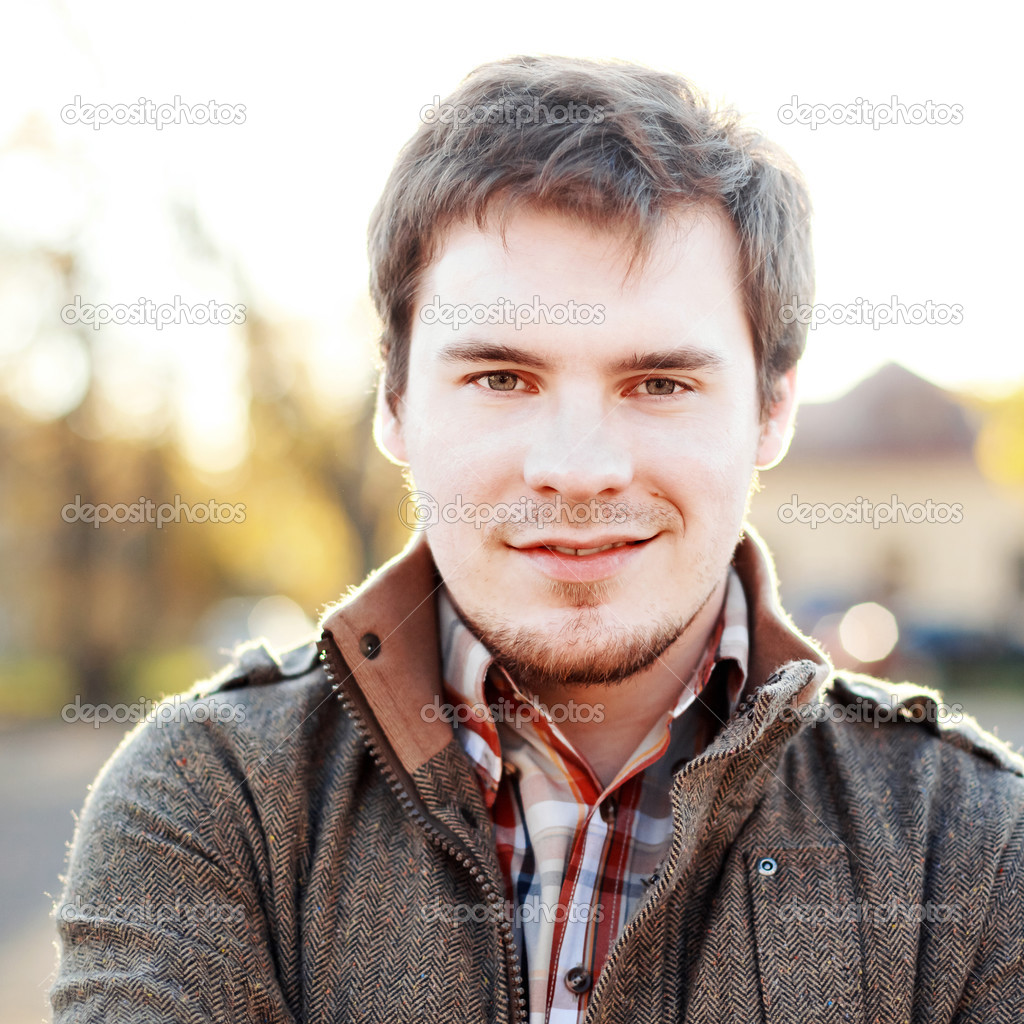 Handsome man outdoors portrait.