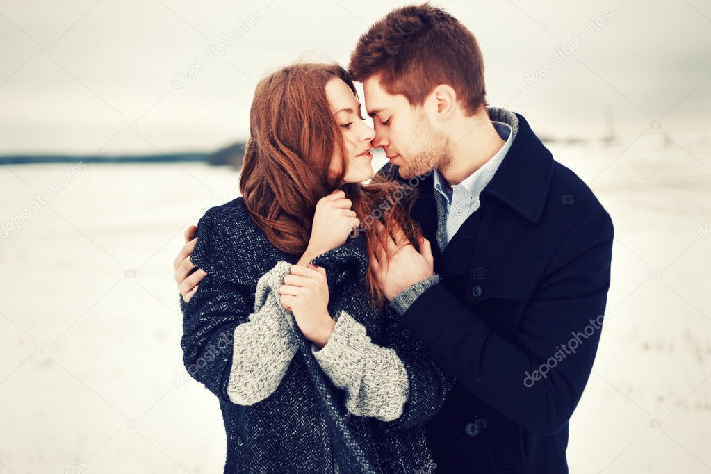 Winter portrait of couple in love