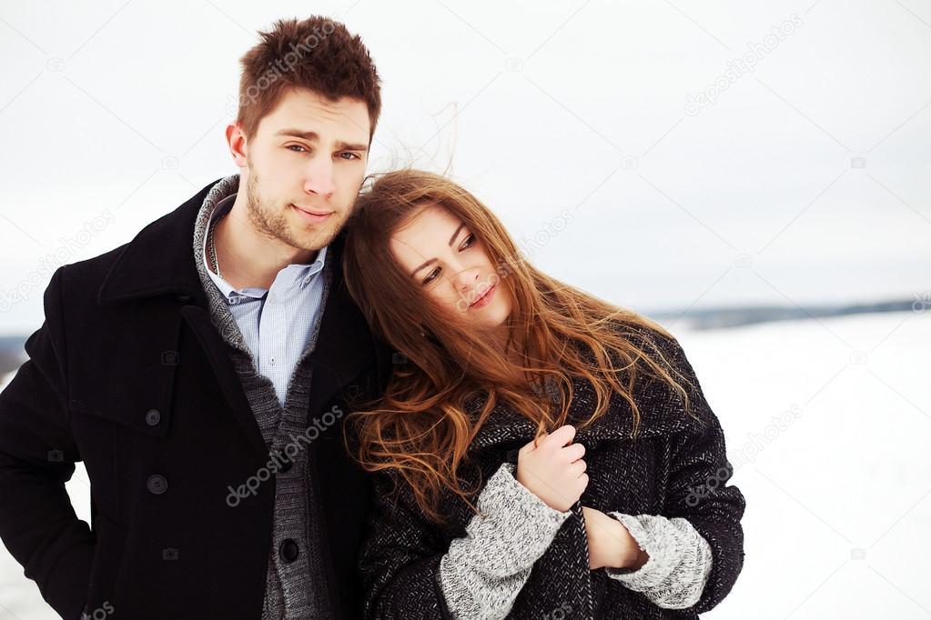 Winter portrait of couple in love