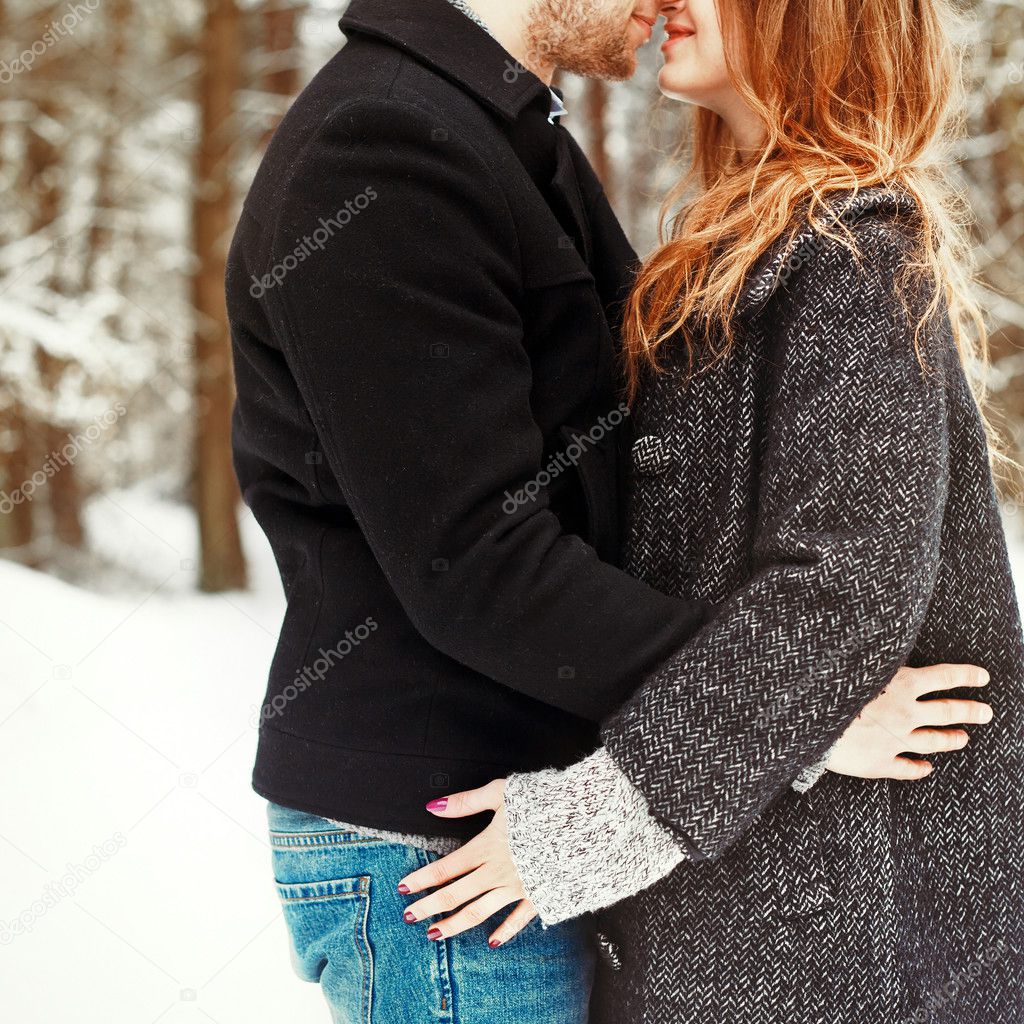 Winter portrait of couple in love