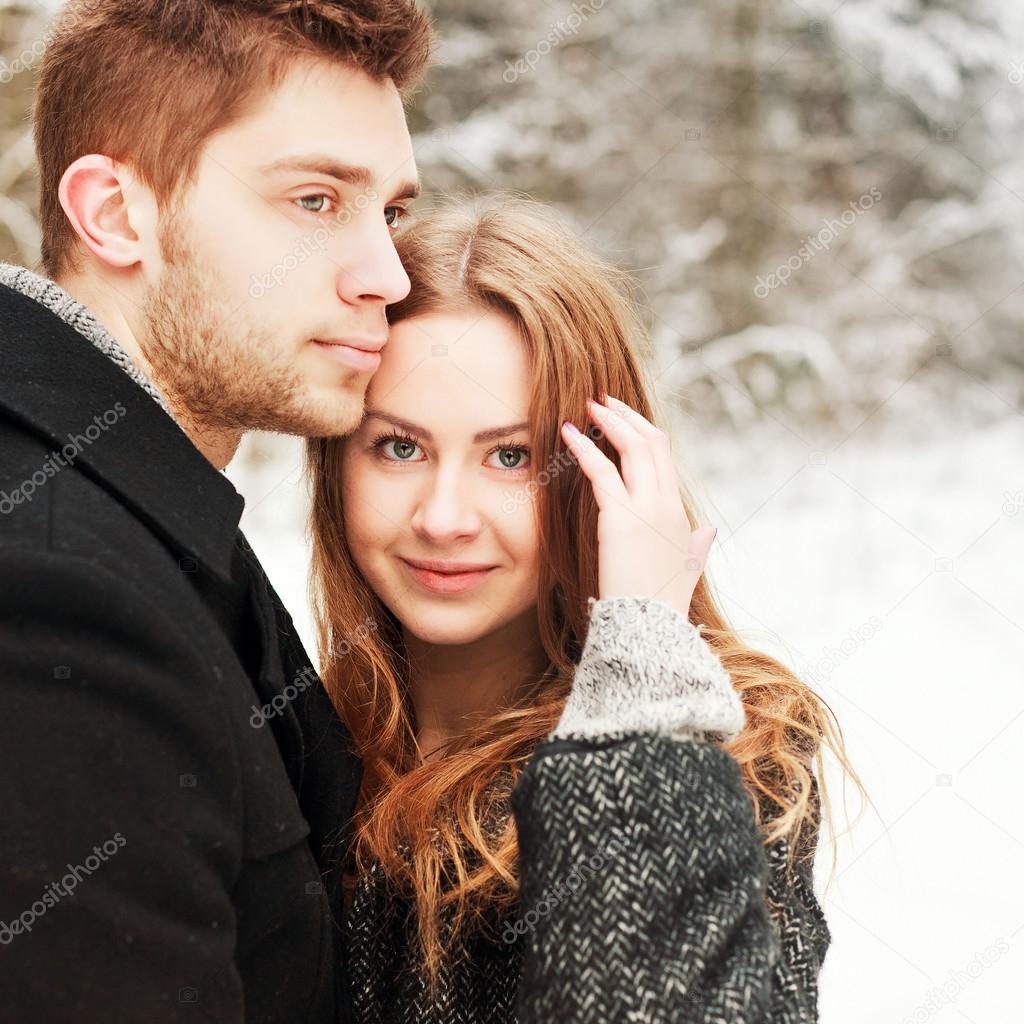 Winter portrait of couple in love