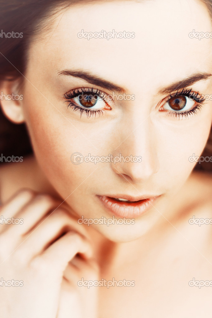 young beautiful brunette with deep eyes