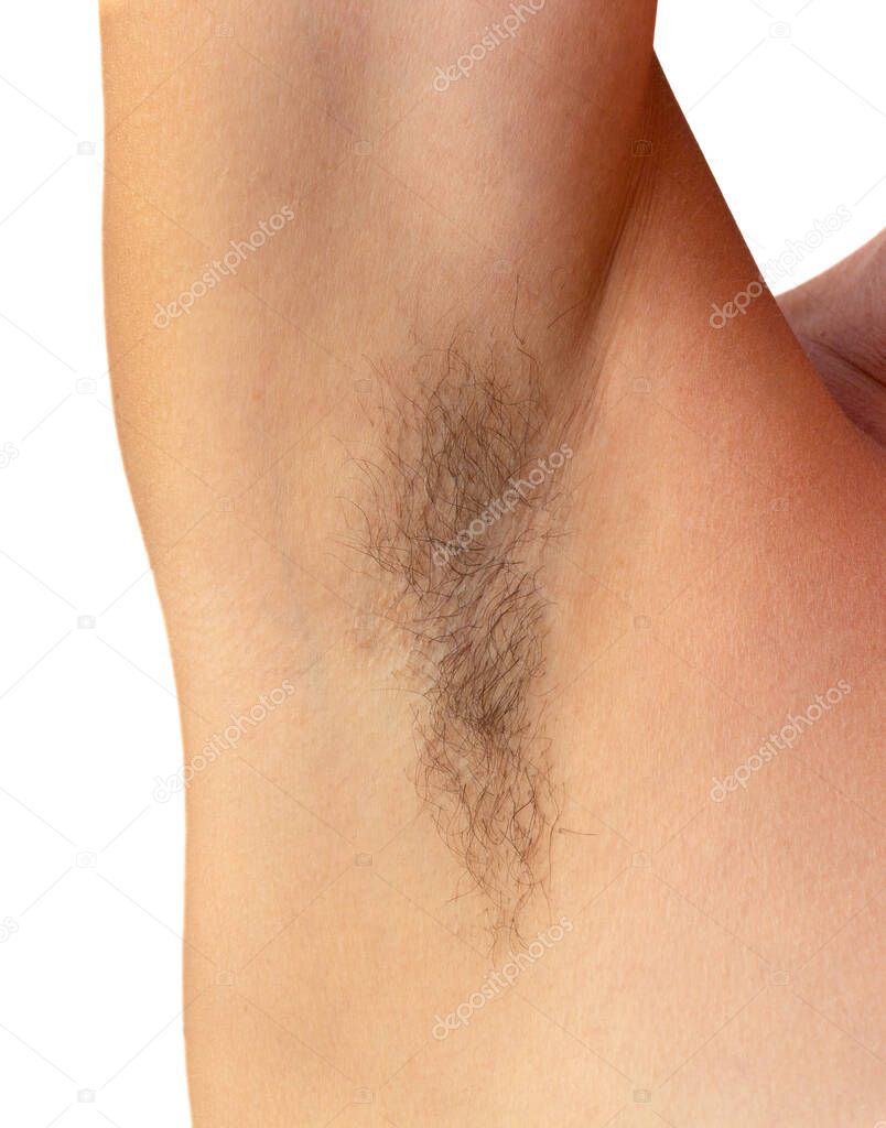 Isolated woman hairy unshaved armpit on white background holding arm straight