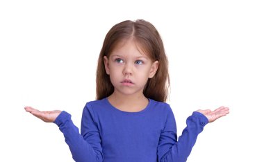Confused with shrug hands, you could objects, what to choose child kid isolated on white background looking aside waist up caucasian little girl of 5 years in blue