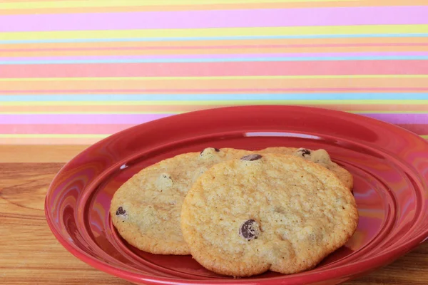 Cookies op een rode plaat 7 — Stockfoto