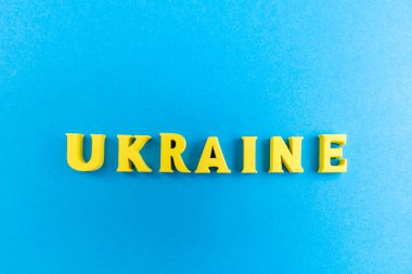 Sarı Arkaplanda Sarı harflerle Ukrayna ismi