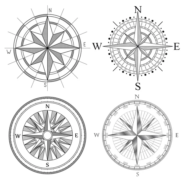 Set illustration of artistic compass. — Stock Vector